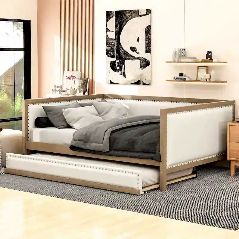 Lit de repos double en bois rembourré avec lit gigogne et décor de clous