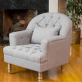 Fauteuil capitonné