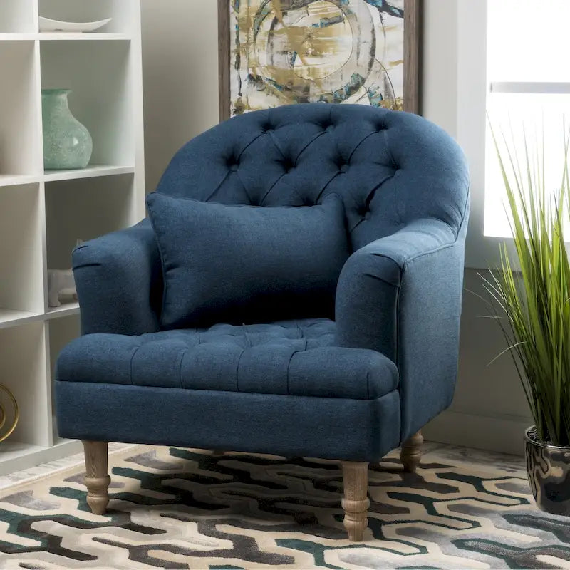 Fauteuil capitonné