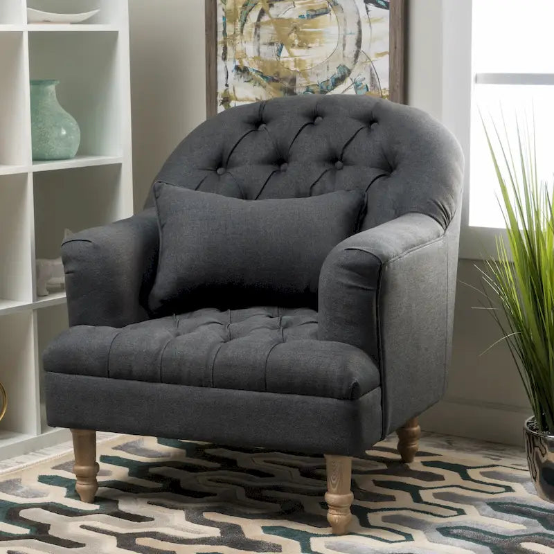 Fauteuil capitonné