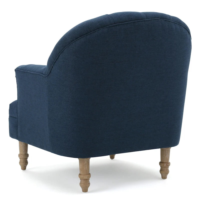 Fauteuil capitonné