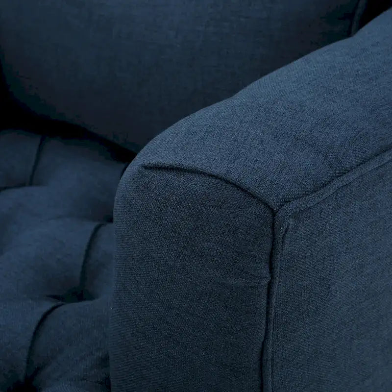 Fauteuil capitonné