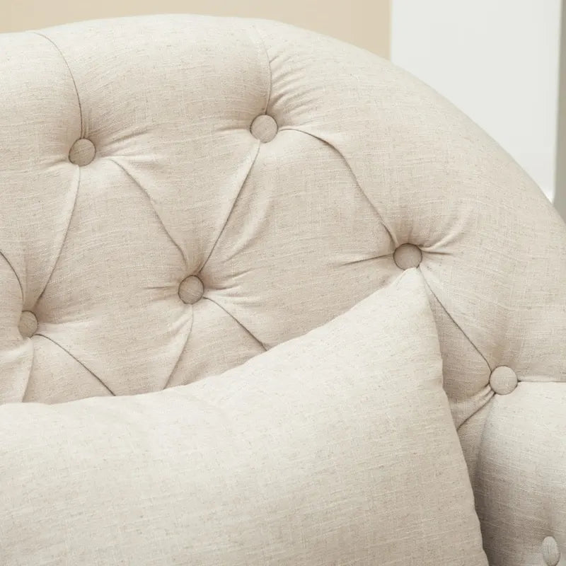 Fauteuil capitonné
