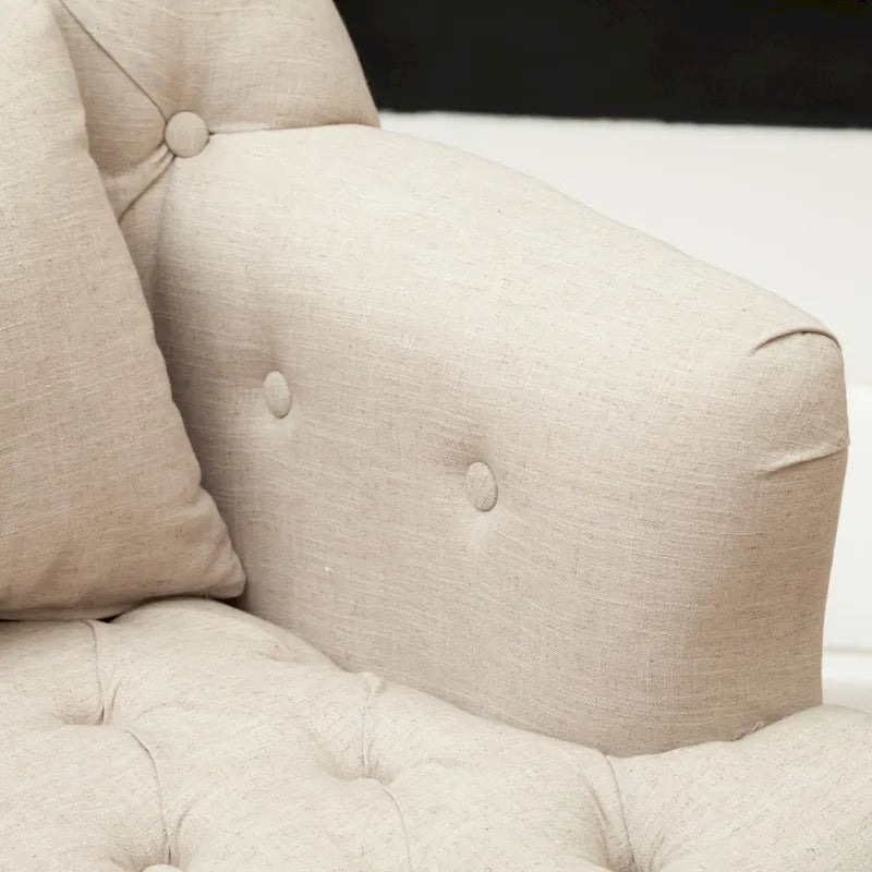 Fauteuil capitonné