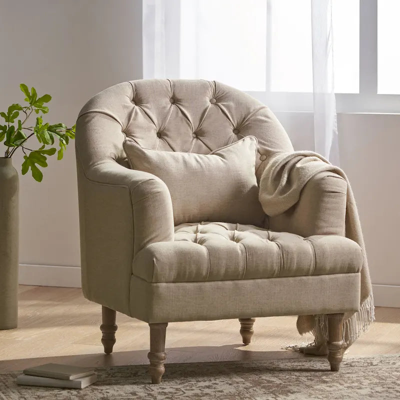 Fauteuil capitonné