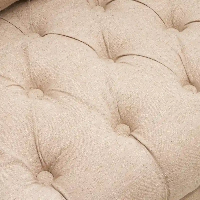 Fauteuil capitonné