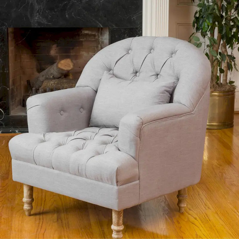 Fauteuil capitonné
