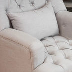 Fauteuil capitonné