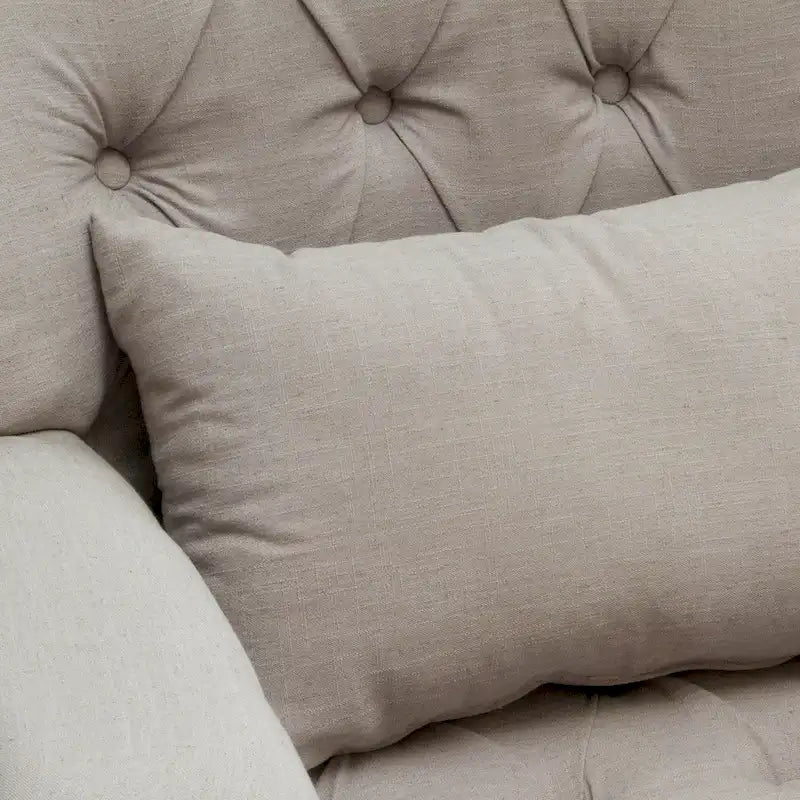 Fauteuil capitonné