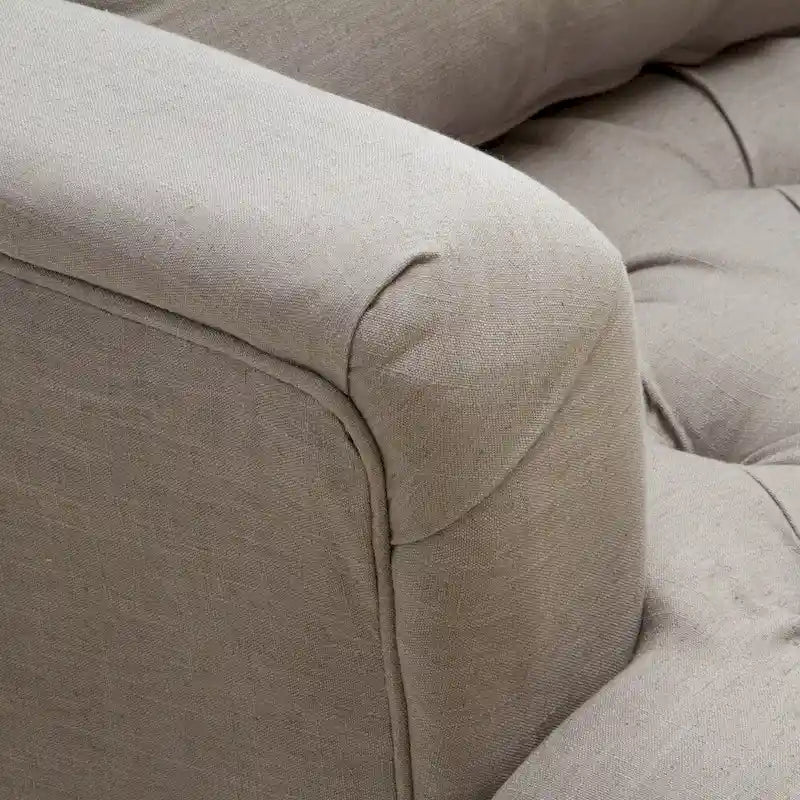 Fauteuil capitonné
