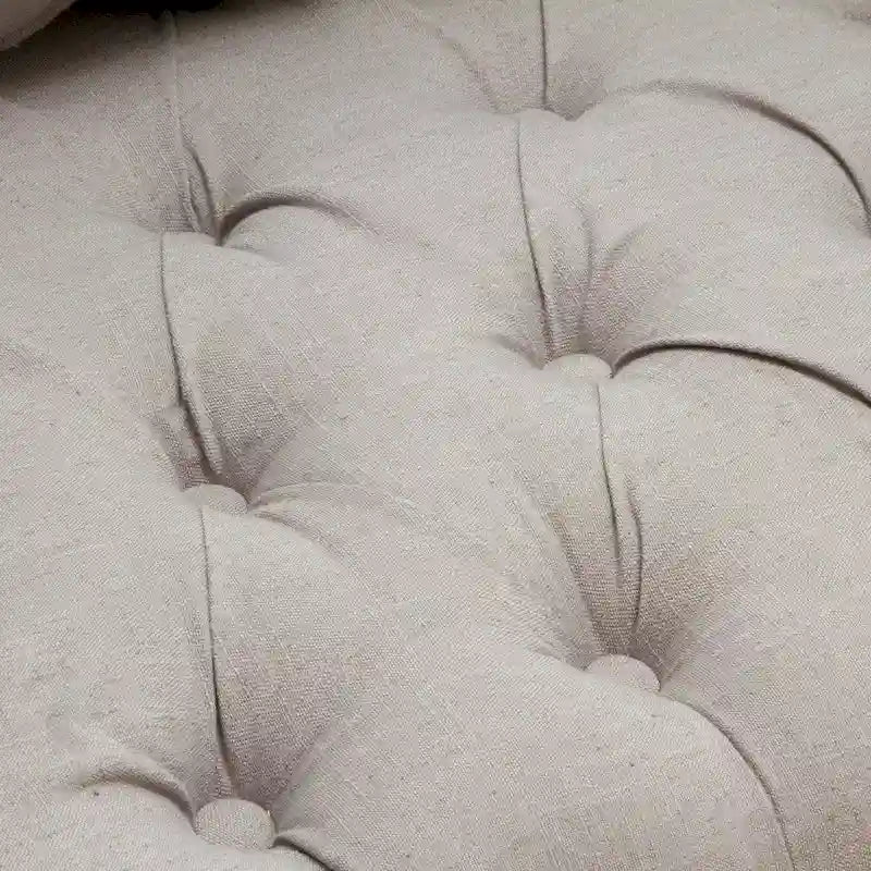 Fauteuil capitonné