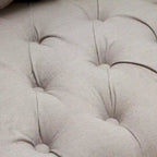 Fauteuil capitonné