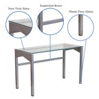 Bureau contemporain en verre trempé transparent avec pieds géométriques et cadre argenté
